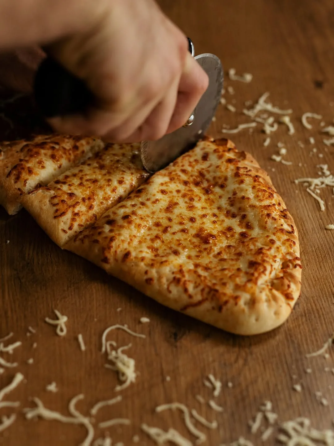 Instagram post: Cheesy calzones are now available at Certified Pizza! - Garlic, Cheesy 