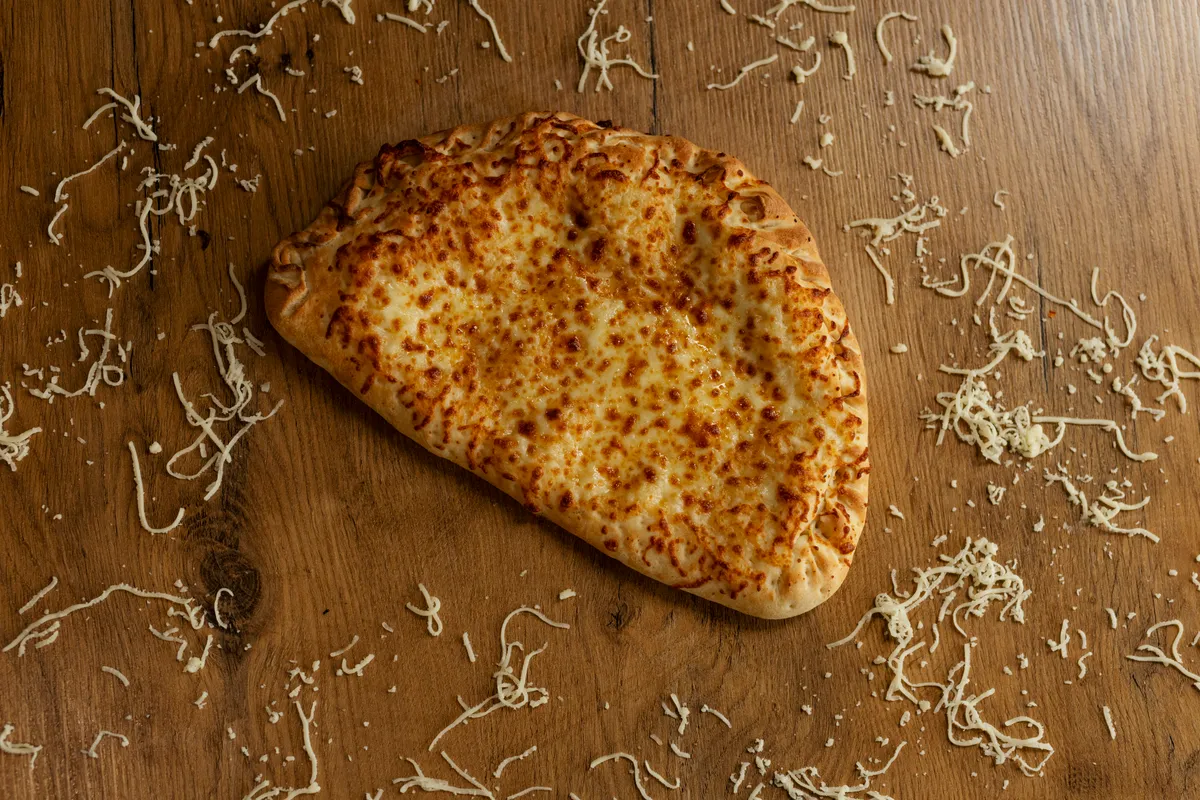 Calzone Herb, Feta, Cheese at Certified Pizza